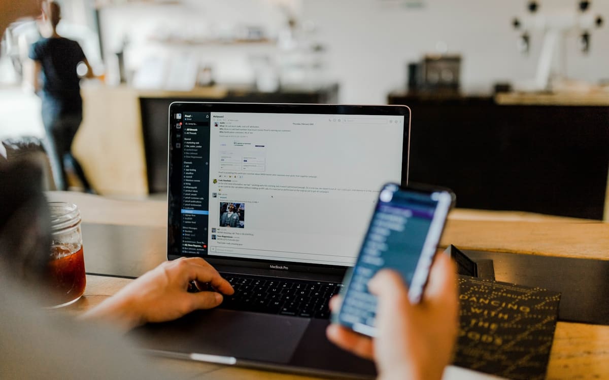 Shopify Combined Listings on a laptop showing a Shopify storefront layout