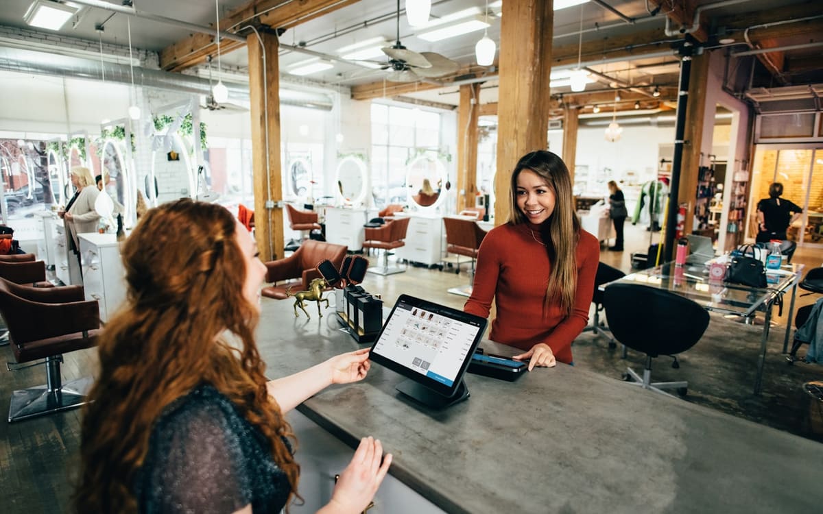 Clothing rails in a shop used as a live catalogue for Shopify Horizon theme migration